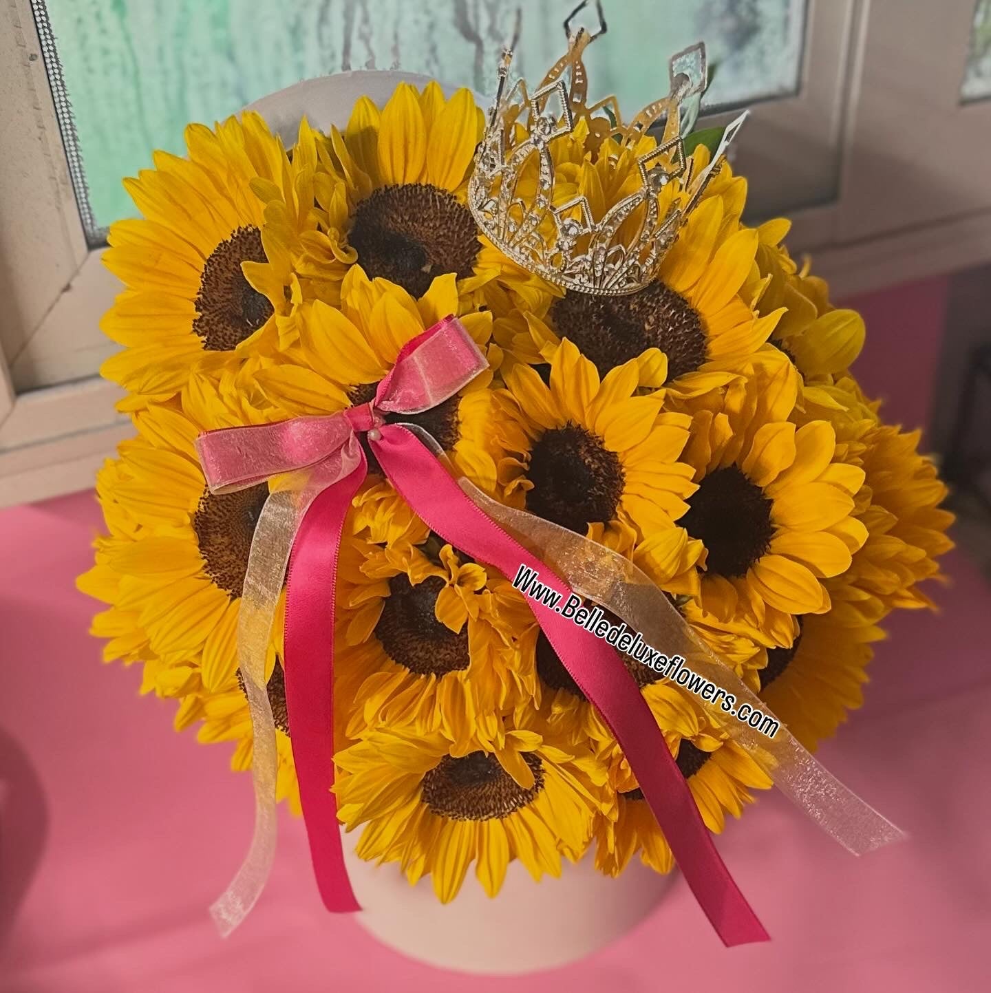 Sunflowers on a box queen
