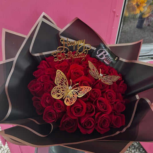 50 red roses on black paper