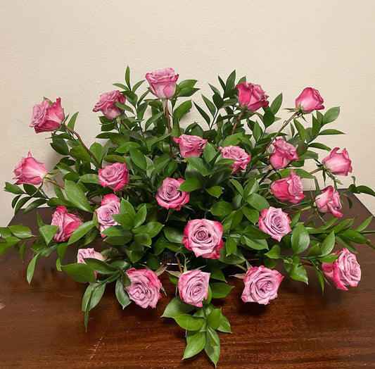 Funeral purple flower arrangement
